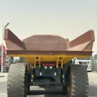 Komatsu HM400-3R articulated dump truck rear view with dump body and tires