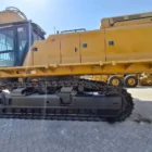 Caterpillar 395 excavator in side view showing the upper structure and crawler undercarriage